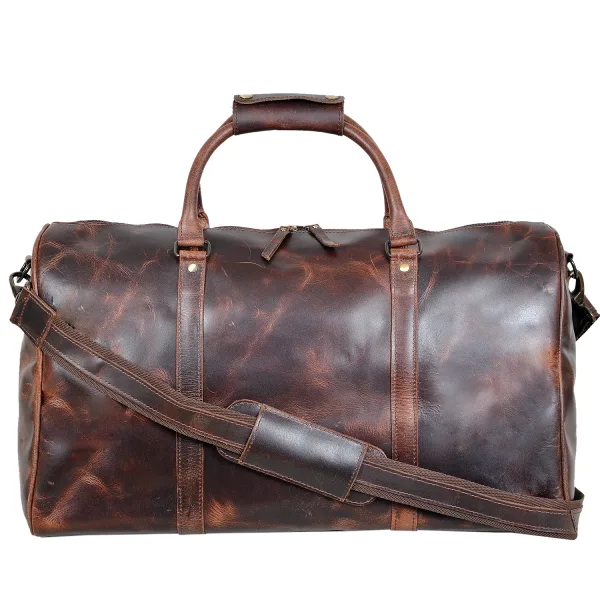 Handcrafted vintage brown genuine leather duffel bag with carry handles, shoulder strap, and natural distressed finish