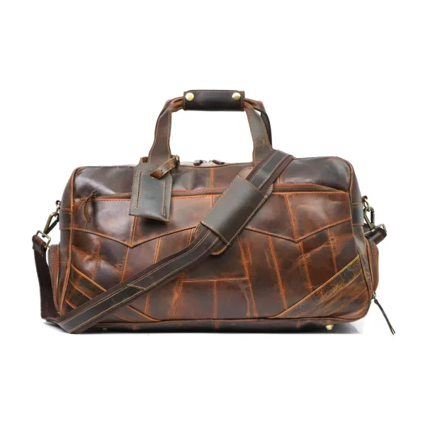 Handcrafted dark brown genuine leather duffel bag with front zipper pocket, sturdy handles, and vintage finish