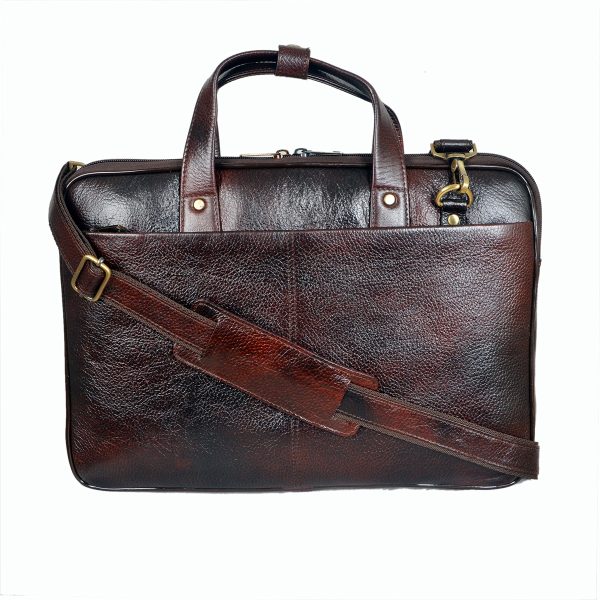Handmade brown genuine leather laptop bag by Volere featuring dual handles, adjustable shoulder strap, and polished brass fittings.
